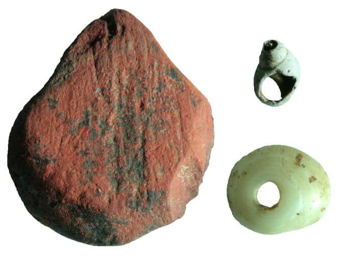 Red ochre along with shell beads were discovered at the early rainforest site of Fa-Hien Lena located in the rainforests of Sri Lanka